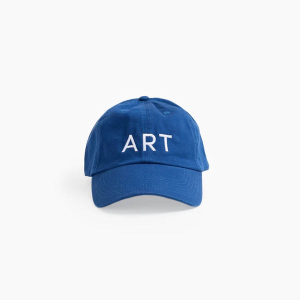 A blue baseball cap with the word "ART" written in white, capital letters across the front.