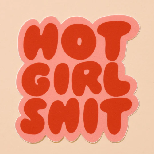 A coral background with a pink sticker in front. The sticker reads "Hot Girl Shit" in red letters with a pink border. 