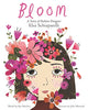 A white book cover with an illustration of a girl with a light skin tone and short brown hair. Her face is partly covered by pink flowers. The title reads "Bloom: A Story of Fashion Designer Elsa Schiaparelli."