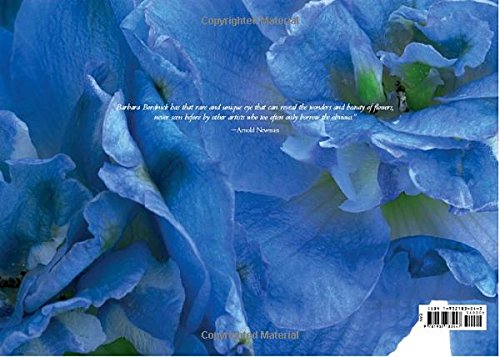 The back of a book featuring a close-up photograph of a blue flower.