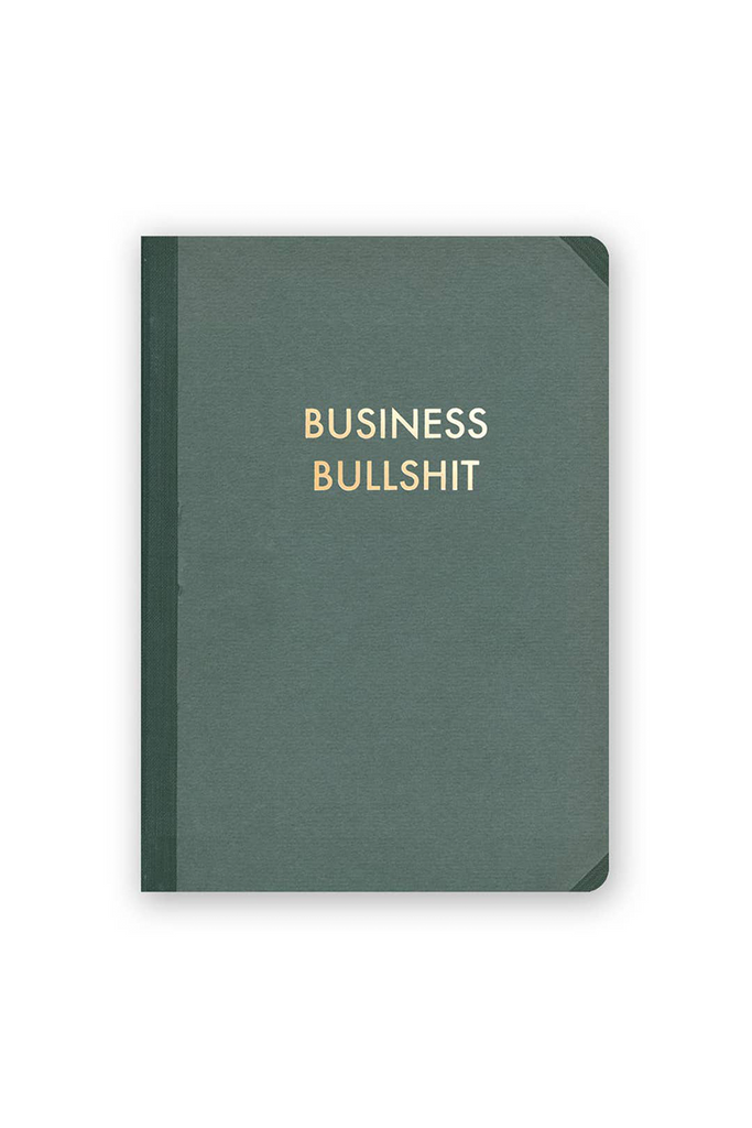 A green notebook with golden text. The text reads "Business Bullshit."