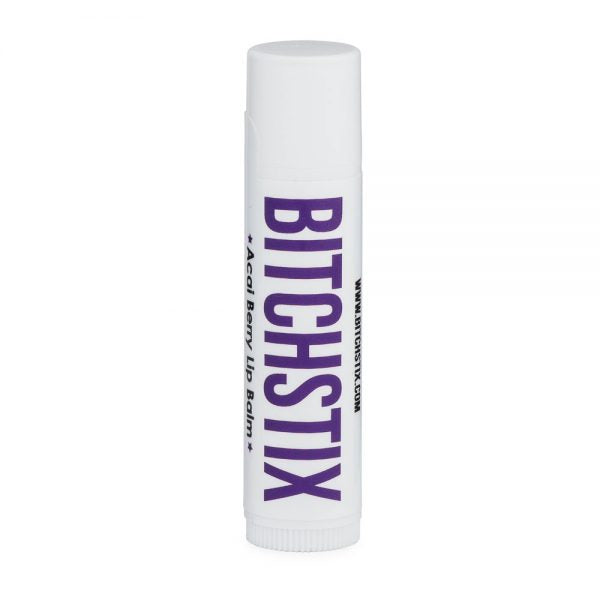 White lipstick and a white box. In purple letters, it says: "Bitchstix."
