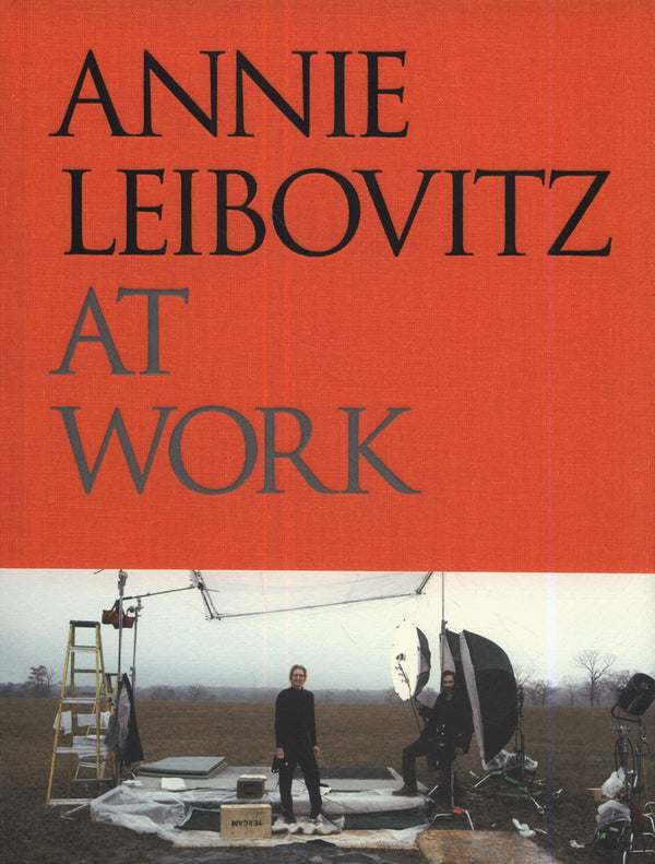 Red book cover with a photograph on the bottom. The title reads: "Annie Leibovitz. At Work."