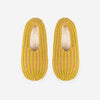 Indoor knit slippers with chunky rib stripes in mustard and beige and fully lined with fleece fabric.