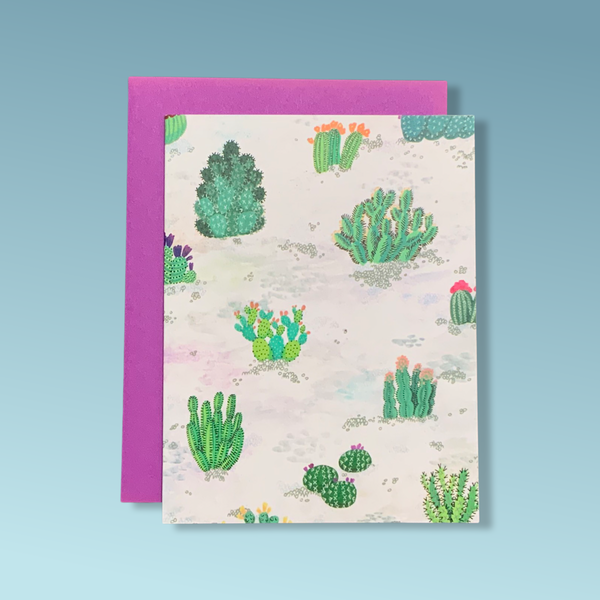 A greeting card with illustrations of cacti.
