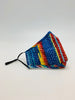 Cotton mask with a colorful abstract pattern.