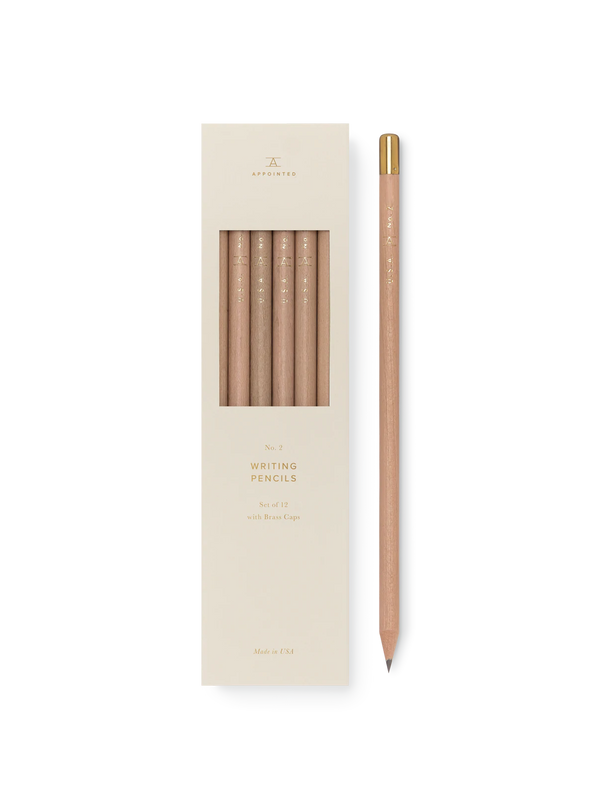 Wooden pencils with golden text packaged in a white box, reading "No. 2 Writing Pencils."