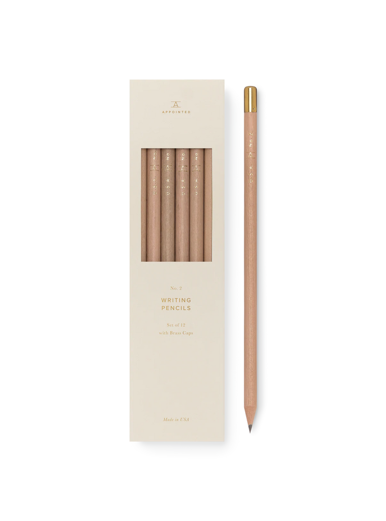 Wooden pencils with golden text packaged in a white box, reading "No. 2 Writing Pencils."