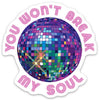 Sticker of a disco ball with text in pink around it, reading "You won't break my soul."