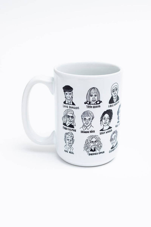 Ceramic mug with illustrations of women's faces, including "Amy Sherald" and "Alma Thomas."