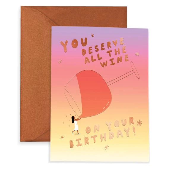 Greeting card with an illustration of a woman drinking out of an oversized wine glass. The text reads: "You deserve all the wine on your birthday."