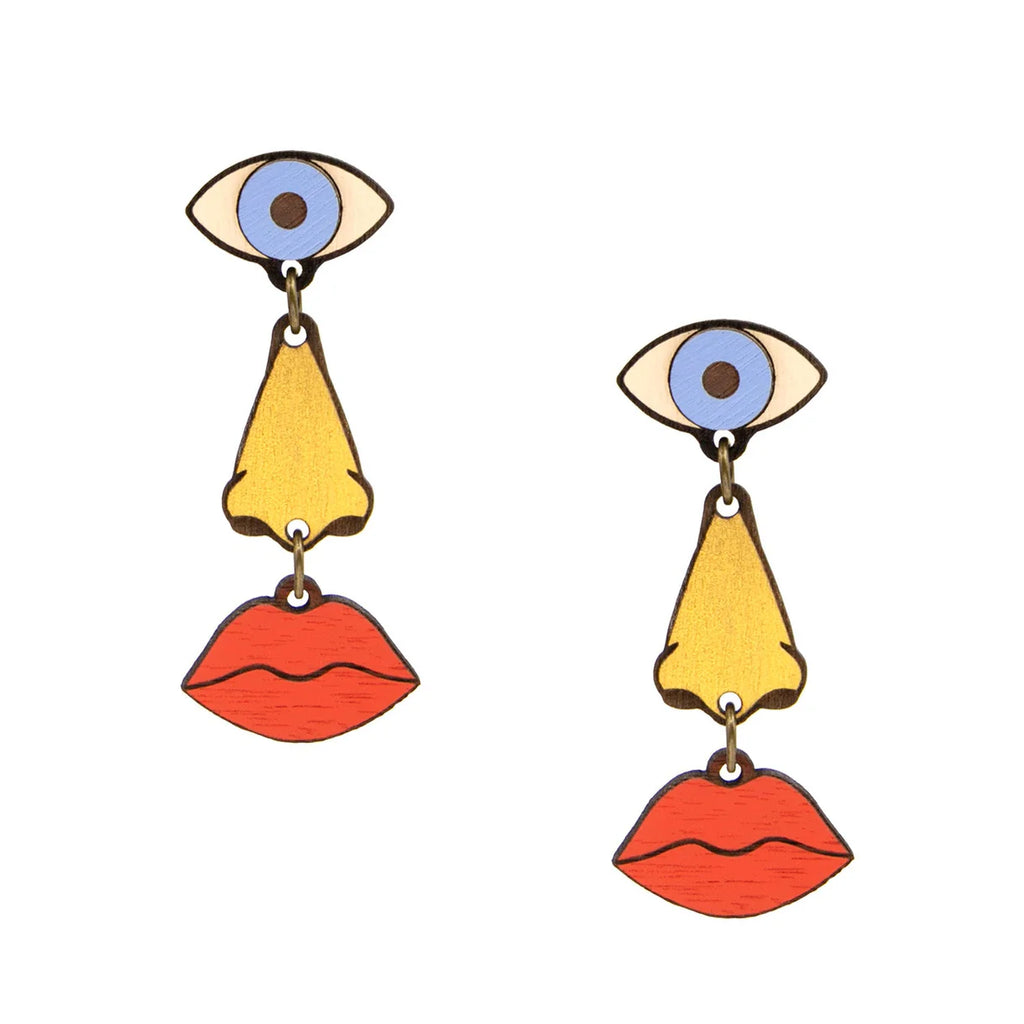 Earrings with an eye, a nose, and lips.
