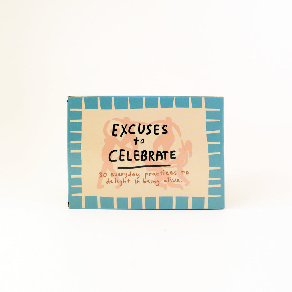 Playing card box in blue and white. The text reads "Excuses to celebrate."