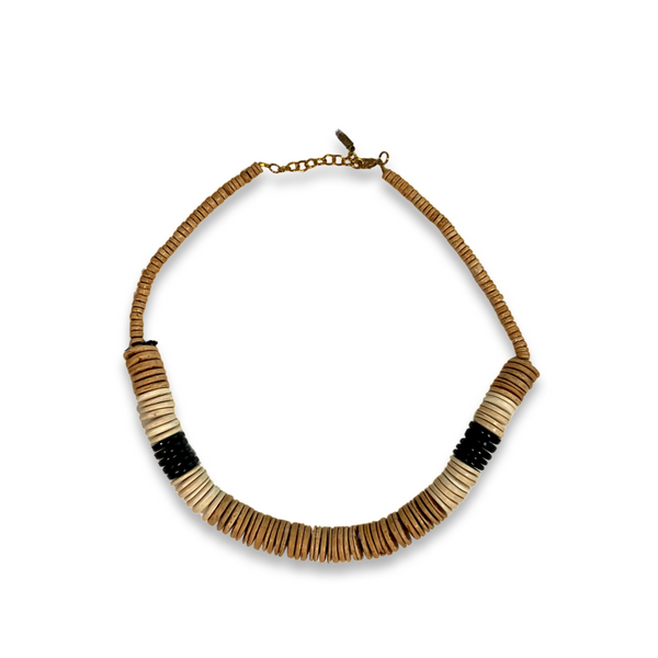 A necklace made fro wooden pieces in beige, brown, and black. 
