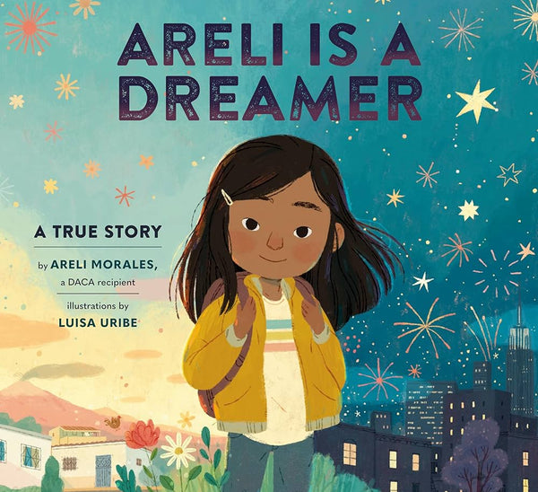 A book cover that features a a cartoon-style Mexican landscape that fades into a New York City Nightscape. A little girl with a medium skin-tone and dark brown hair is in the foreground. She is wearing a backpack and smiling. Her outfit consists of a yellow coat and a white shirt with a blue, pink, and yellow stripe across the top. The title of the book, "Areli Is A Dreamer" is written in purple letters. On the left side of the book are the words "A True Story" followed by information about the author. 