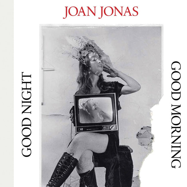 A white book with an image of a woman sitting in a chair. The title "Joan Jonas: Good Night Good Morning" is surrounding the picture. 