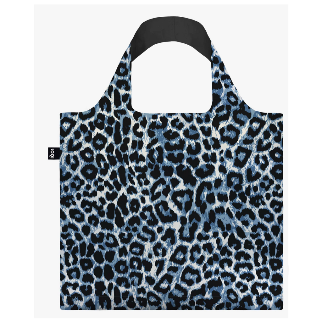 A reusable tote bag with a blue, black, and white leopard print pattern with handle.