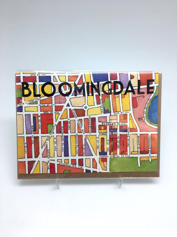 Greeting card with a colorful illustration of a city map. The text reads "Bloomingdale."