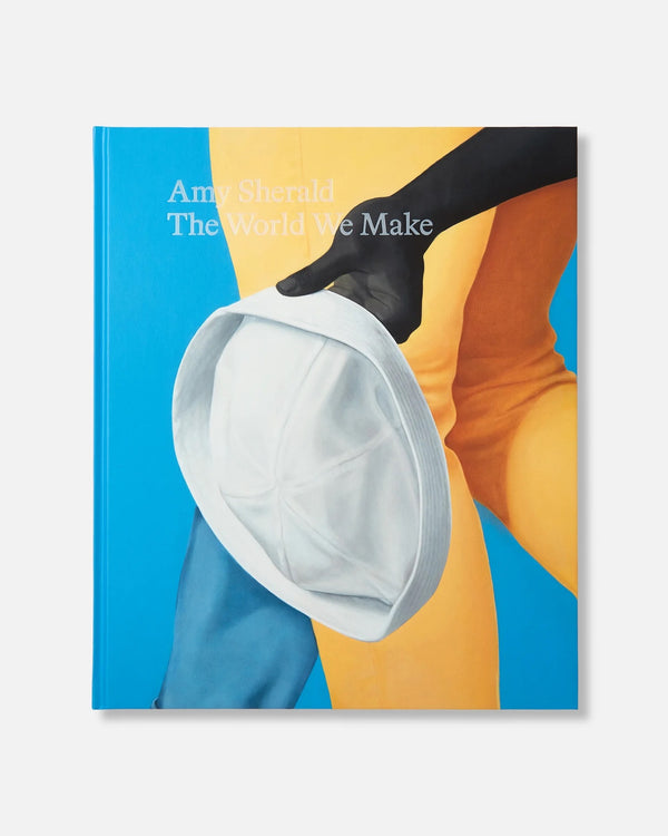 Colorful book cover depicting a close up of a painting. The text reads: "Amy Sherald: The World We Make."