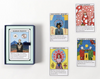 Several playing cards depicting colorful illustrations of people, including the artist Yayoi Kusama and Jean-Michel Basquiat.