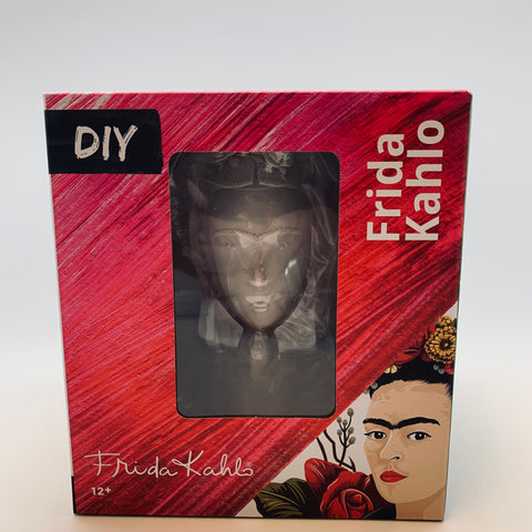 A box with a woman's face printed onto it. Through a window, you can see a figure of the same woman's face in a gray tone.
