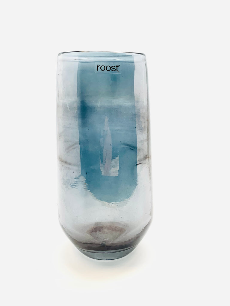 A glass with a blue accent. The sticker on the glass reads "roost."