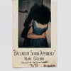 Book cover with a photograph of a woman's back and a text written in handwriting, reading "Ballads of Sexual Dependency, Nan Goldin."