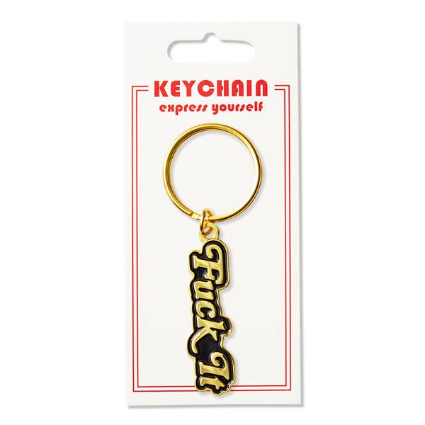 Black and golden keychain with the text "Fuck it."