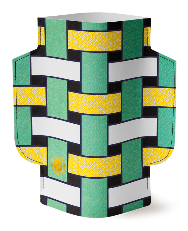 A vase made out of colorful paper with an abstract pattern. The colors are green, yellow, white, and black.